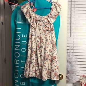 woman’s off the shoulder dress